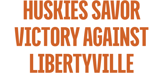 huskies savor victory against libertyville
