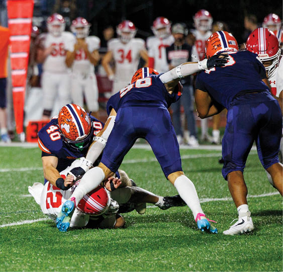 A group of football players celebrating a victory. AI generated content