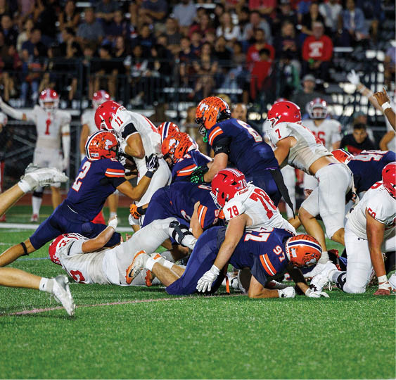 A group of football players celebrating a victory. AI generated content