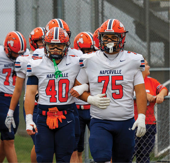 A group of football players celebrating a victory. AI generated content