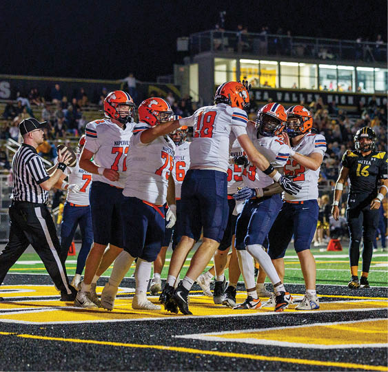 A group of football players celebrating a victory. AI generated content