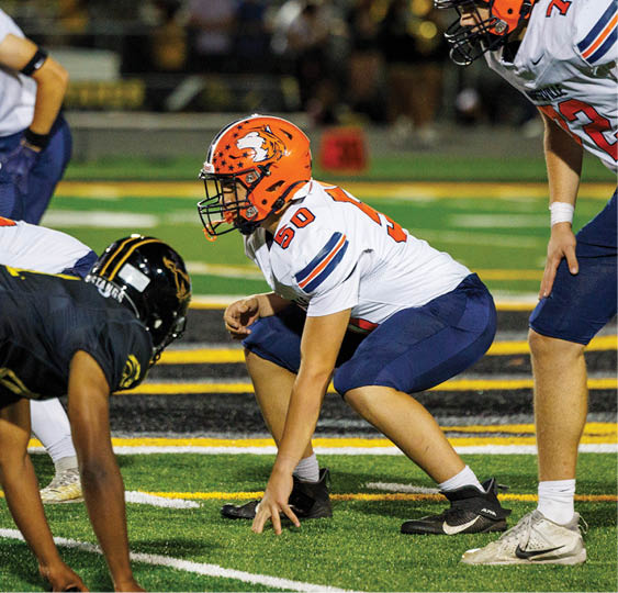A group of football players celebrating a victory. AI generated content
