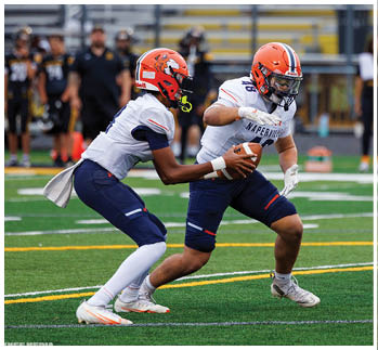 A football player running on the field. Description generated by AI