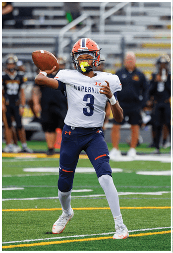 A football player running on the field. Description generated by AI