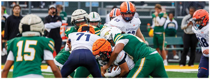 A football player is sliding on the ground. Description generated by AI