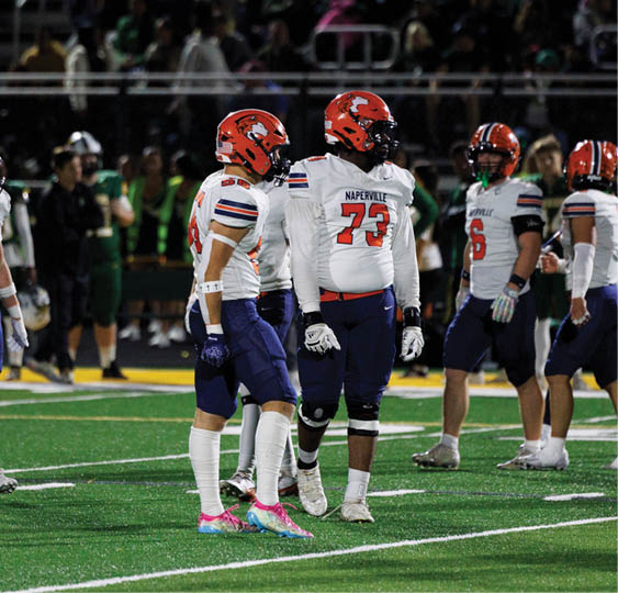 A group of football players celebrating a victory. AI generated content