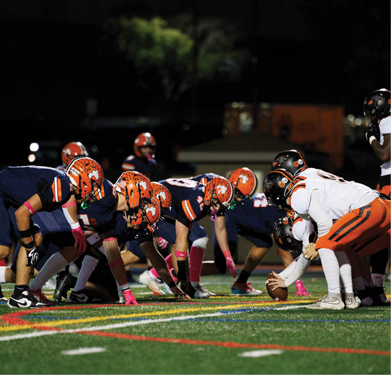 A group of football players celebrating a victory. AI generated content