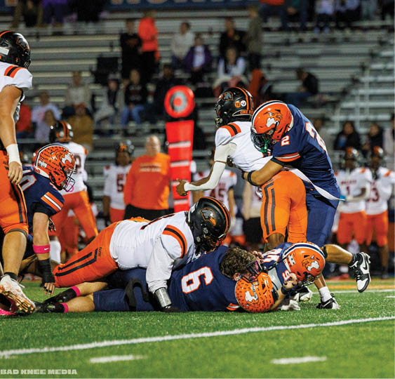 A group of football players celebrating a victory. AI generated content
