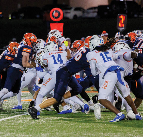 A group of football players celebrating a victory. AI generated content