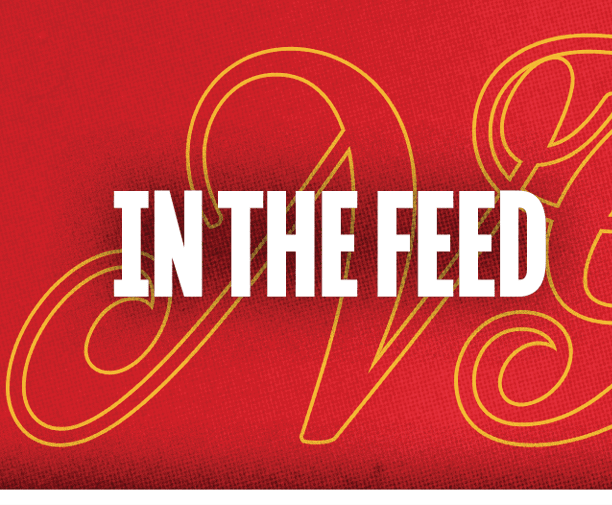 A yellow and red background with the word “In the Feed" written on it. Description generated by AI