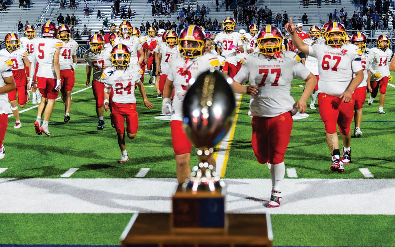 A trophy is on a stand. Description generated by AI