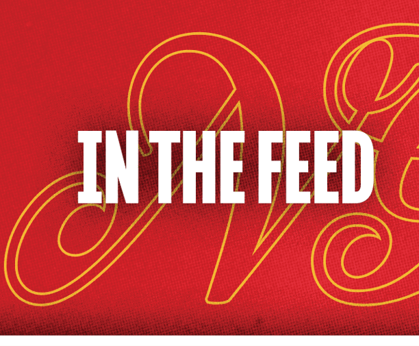 A yellow and red background with the word “In the Feed" written in black. Description generated by AI