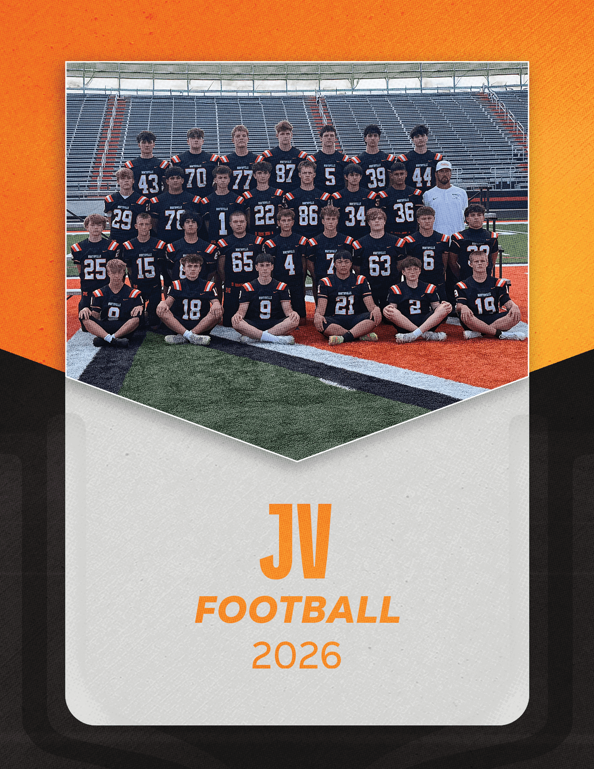 A group of football players sitting on a bench. Description generated by AI