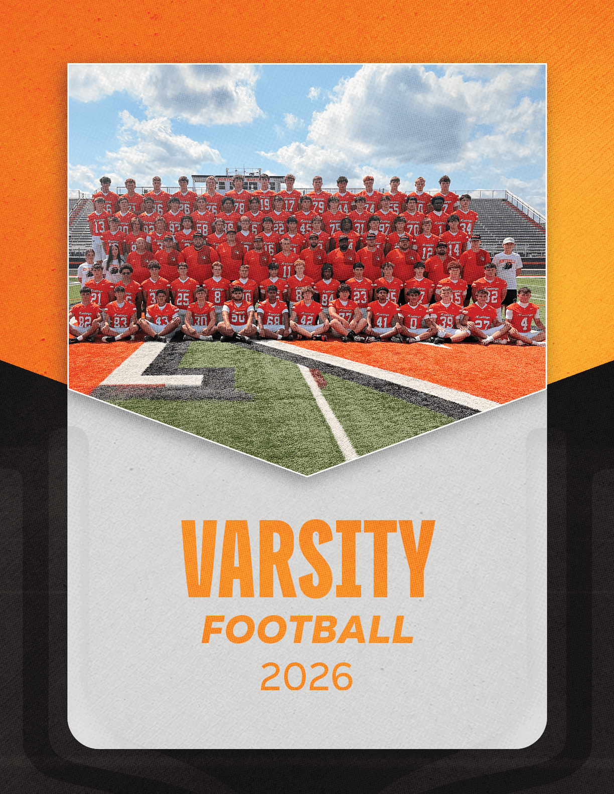 A group of football players sitting on a bench. Description generated by AI