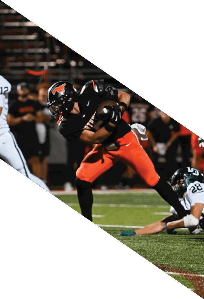 Four football players pose for a picture on the field. AI generated content