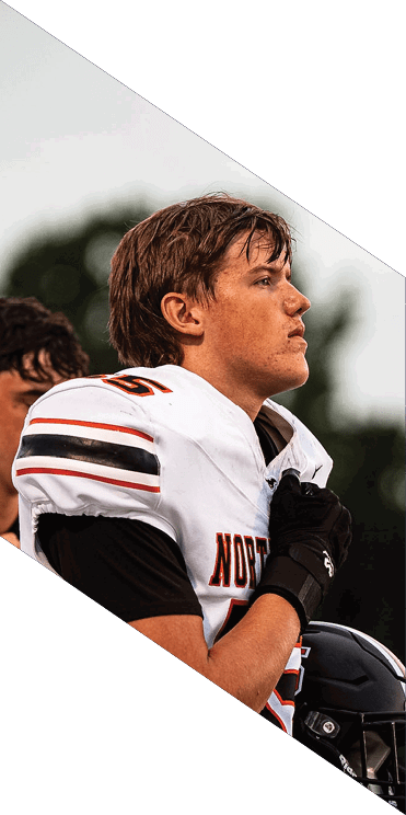 A group of football players wearing headphones and smiling. AI generated content