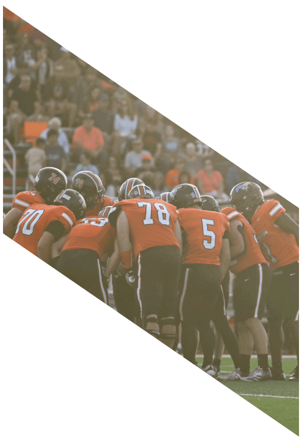 A group of young men wearing black and white uniforms are standing on a field. AI generated content