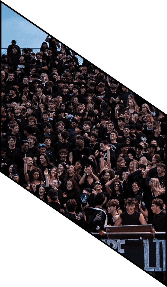 A group of people wearing black jerseys are huddled together on a field. AI generated content