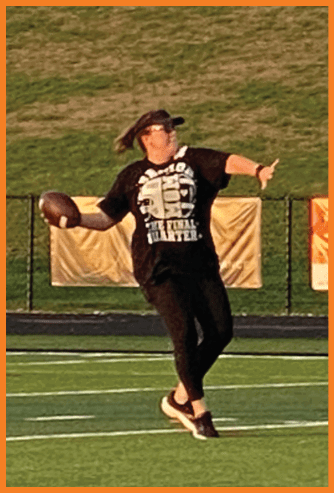 A football game is being played on a field. Description generated by AI