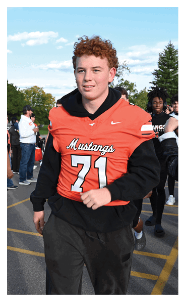 A football player wearing a black and white uniform with the number 10 on the back. AI generated content