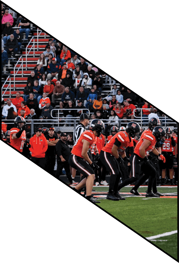 Four football players pose for a picture on the field. AI generated content