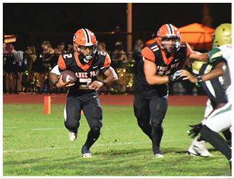 A football player is sliding on the ground. Description generated by AI