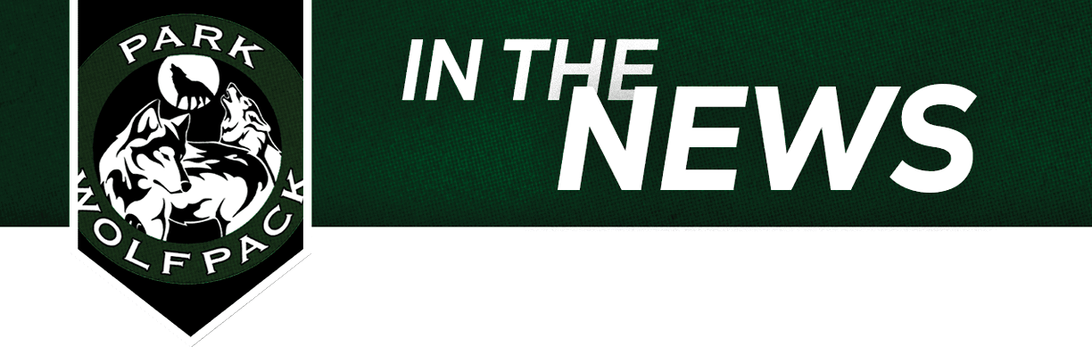 A green and black banner features a wolf pack logo on the left and the bold white text “IN THE NEWS" on the right. Description generated by AI