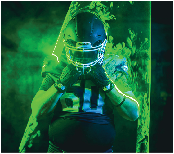 A person wearing a football helmet, gloves, and jersey with the number 90 stands in front of a green smoky background with a decorative pattern behind them. Description generated by AI