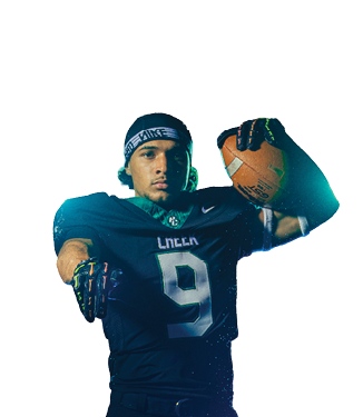 Person wearing a dark football uniform with the number nine and a headband is holding a football and pointing forward. Description generated by AI