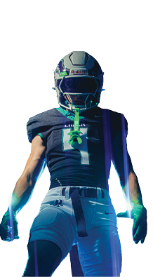 A person wearing a football uniform and helmet is standing with a confident posture against a white background. Description generated by AI