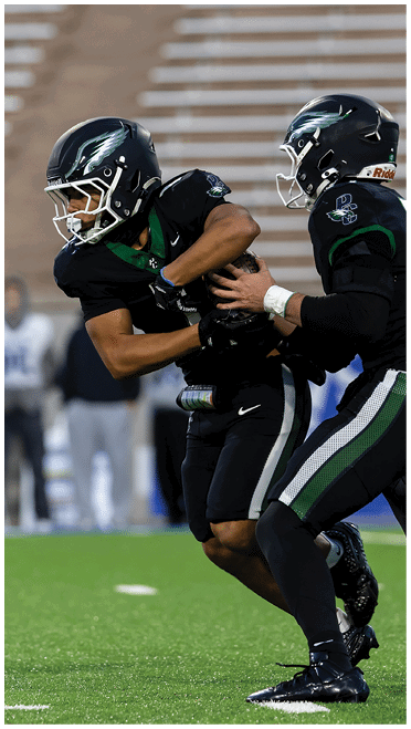 Person wearing a dark sports helmet with a blurred background of horizontal lines. Description generated by AI