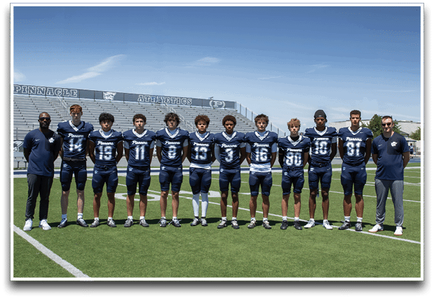 Three football players are standing on the field, one of them is smiling and wearing a black jersey with the number 55. AI generated content