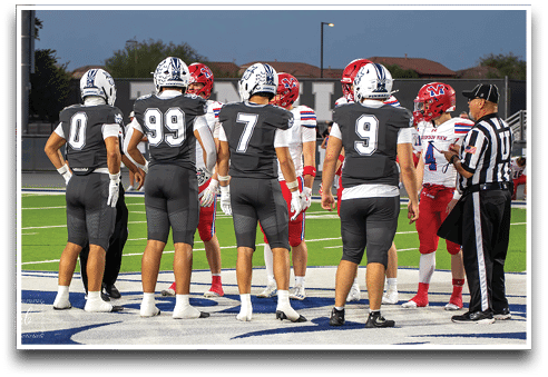 Three football players are standing on the field, one of them is smiling and wearing a black jersey with the number 55. AI generated content