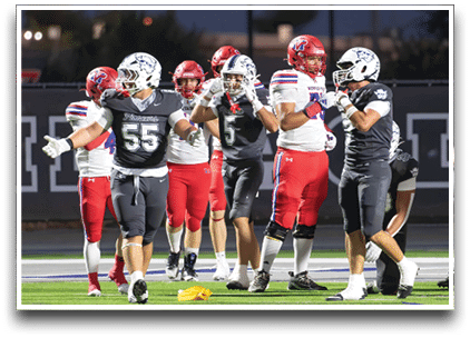 Three football players are standing on the field, one of them is smiling and wearing a black jersey with the number 55. AI generated content