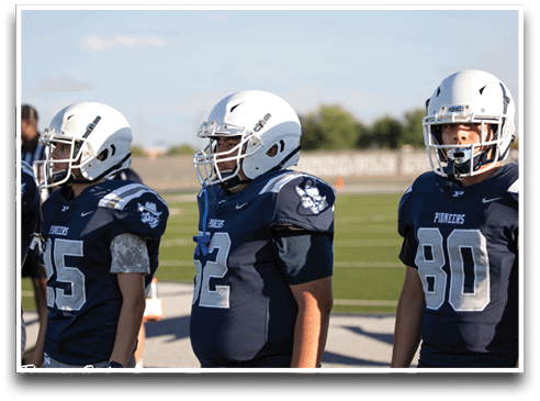 Three football players are standing on the field, one of them is smiling and wearing a black jersey with the number 55. AI generated content