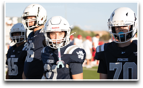 Three football players are standing on the field, one of them is smiling and wearing a black jersey with the number 55. AI generated content