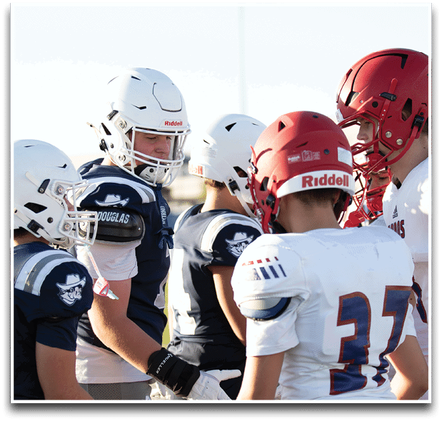 Three football players are standing on the field, one of them is smiling and wearing a black jersey with the number 55. AI generated content