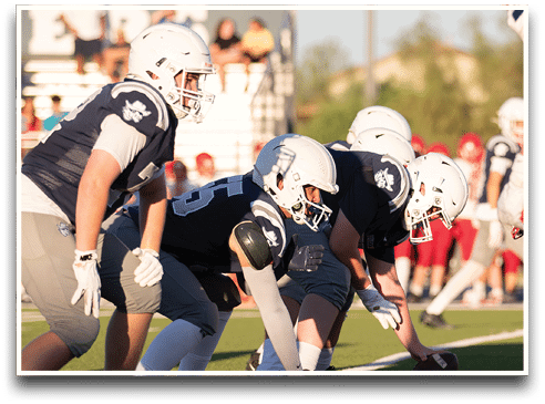 Three football players are standing on the field, one of them is smiling and wearing a black jersey with the number 55. AI generated content
