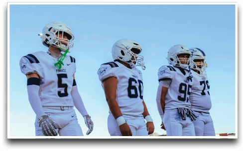 Three football players are standing on the field, one of them is smiling and wearing a black jersey with the number 55. AI generated content