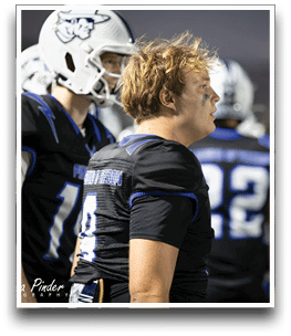 Three football players are standing on the field, one of them is smiling and wearing a black jersey with the number 55. AI generated content