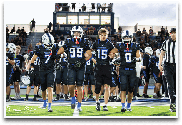Three football players are standing on the field, one of them is smiling and wearing a black jersey with the number 55. AI generated content