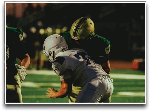 Three football players are standing on the field, one of them is smiling and wearing a black jersey with the number 55. AI generated content