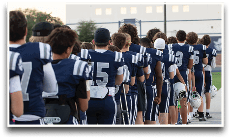 Three football players are standing on the field, one of them is smiling and wearing a black jersey with the number 55. AI generated content