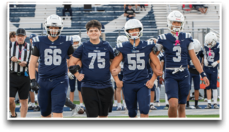 Three football players are standing on the field, one of them is smiling and wearing a black jersey with the number 55. AI generated content