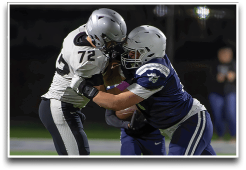 Three football players are standing on the field, one of them is smiling and wearing a black jersey with the number 55. AI generated content