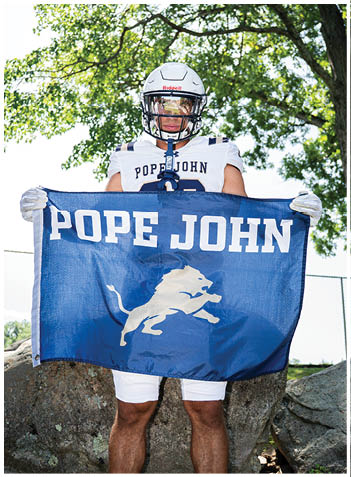 A football player wearing a blue jersey with the number 58 on it. Description generated by AI