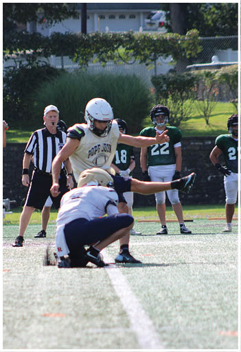 A football player running on the field. Description generated by AI