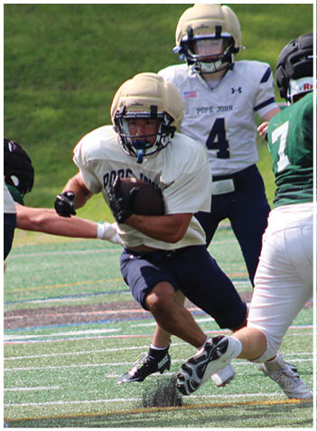 A football player wearing a blue jersey with the number 58 on it. Description generated by AI