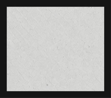 A white wall with a gray border. Description generated by AI