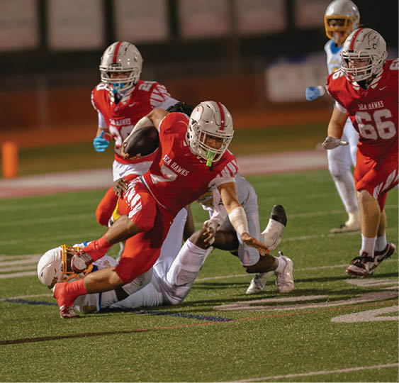 A group of football players celebrating a victory. AI generated content